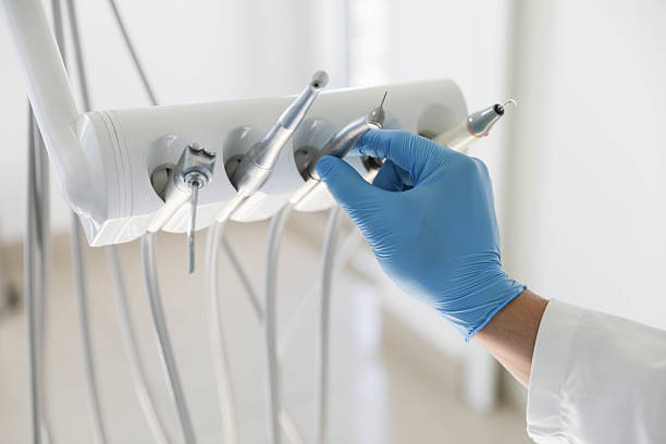 Professional Emergency Dentist technician working in Angleton, TX